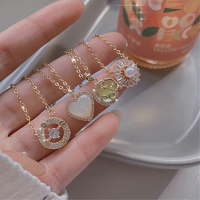Dây chuyền hình trái tim hành tinh đính kim cương đơn giản cho nữ
