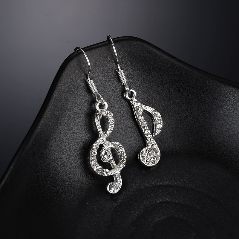 E1368 Korea anti-allergy long tassu personal fashion diamond asymmetric ears