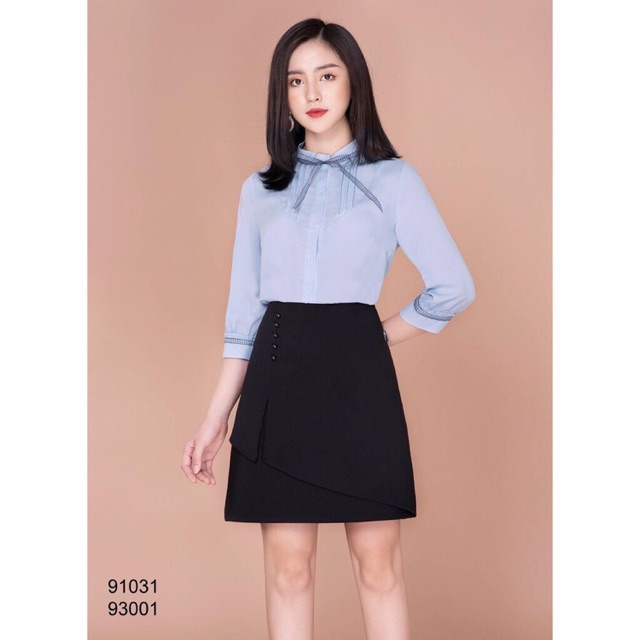 Chân váy chữ a đắp vạt phối cúc trẻ trung