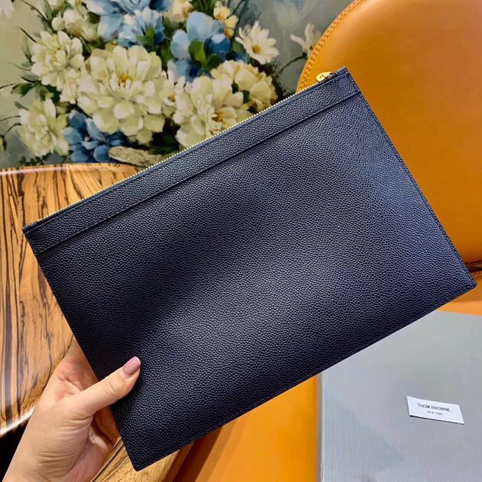 Ví cầm tay Thom Browne size 30*20