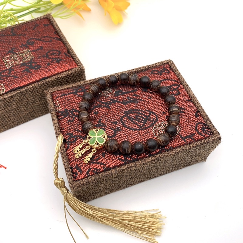 Vòng tay phong thuỷ trầm hương trầm sánh mix cỏ 4 lá