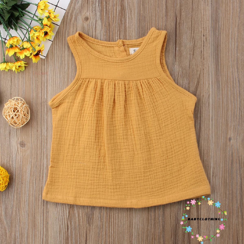 Set áo ngắn tay cổ tròn + chân váy ngắn xếp ly thời trang cho bé gái