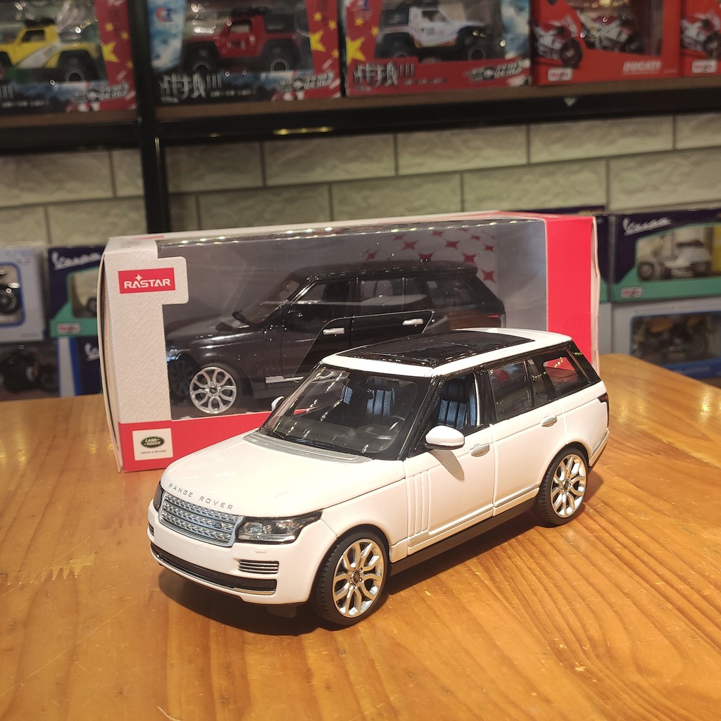 Mô hình xe ô tô trưng bày Range Rover Land Rover hãng Rastar tỉ lệ 1:24 màu trắng