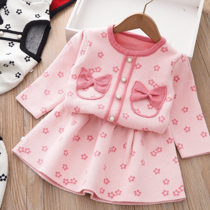 Váy bé gái họa tiết hoa đào 2 nơ túi ngực áo croptop và chân váy 8-30kg XHN1092