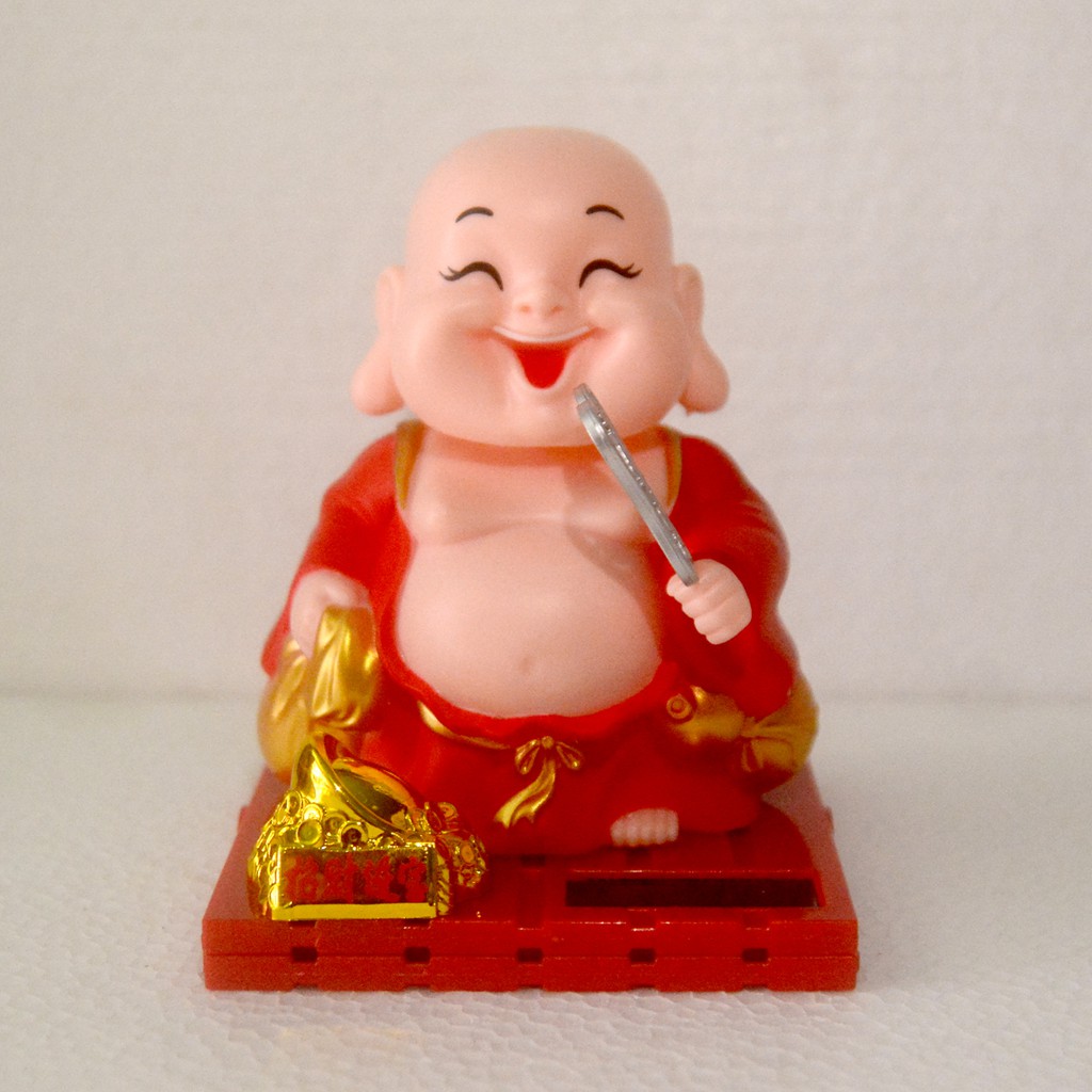 Tượng Di Lặc vẫy quạt-Thần tài thỏi vàng-Con lân gật đầu năng lượng mặt trời