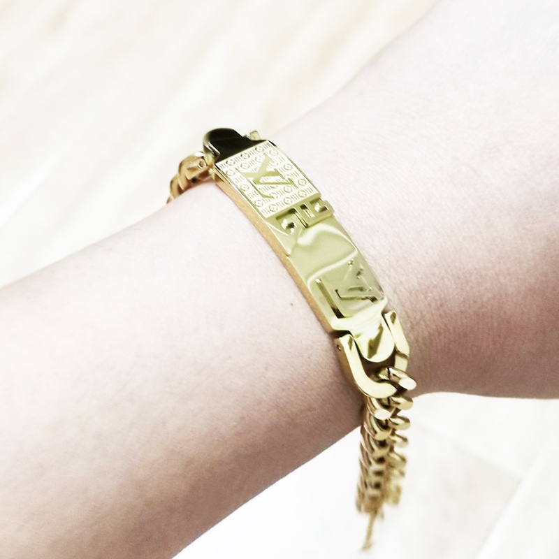 Lắc Tay Nữ Titan Không Rỉ Dây Xích Bản To Logo TT 4127