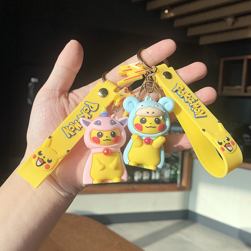 the creative personality of pikachu schobag around plastic plastic plastic dolls in the car with the keys of his necklace.