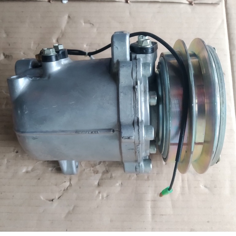 Lốc điều hòa  Komatsu 12V / 24V hàng Trung Quốc