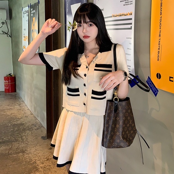 Set đồ 2 món ZHELIHANGFEI gồm áo sơ mi dệt kim cổ polo ngắn tay và chân váy eo cao phong cách gợi cảm