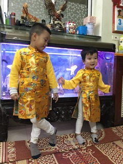 Áo dài gấm pha lụa