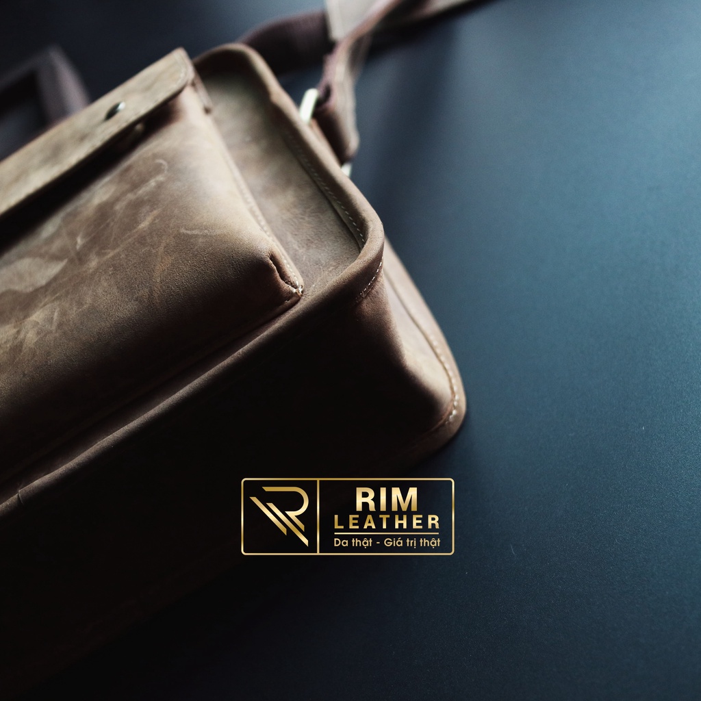 Túi đeo chéo dáng ngang. Bảo hành 2 năm