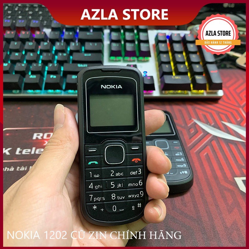 Nokia 1202 cũ zin chính hãng kèm sạc pin