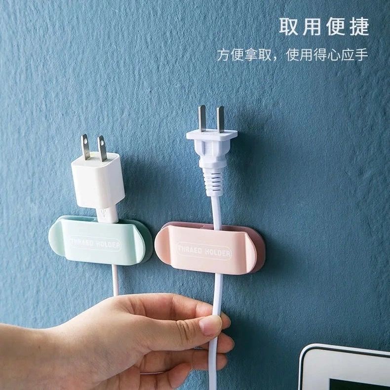 Kẹp dán tường treo phích cắm điện đa năng không cần khoan tiện lợi