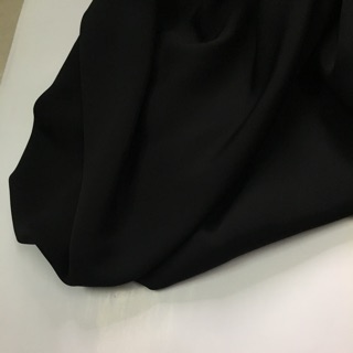 Vải đen may quần áo