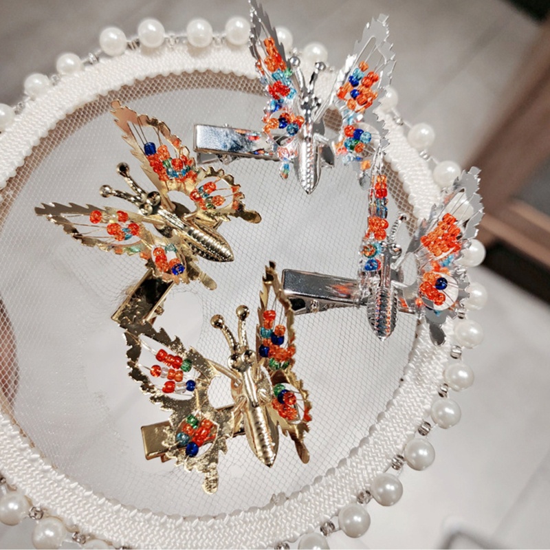 Kẹp Tóc Tua Rua Hình Cánh Bướm Đính Ngọc Trai Cho Nữ