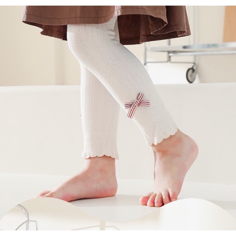Quần tất đính nơ cho bé gái hàng qc