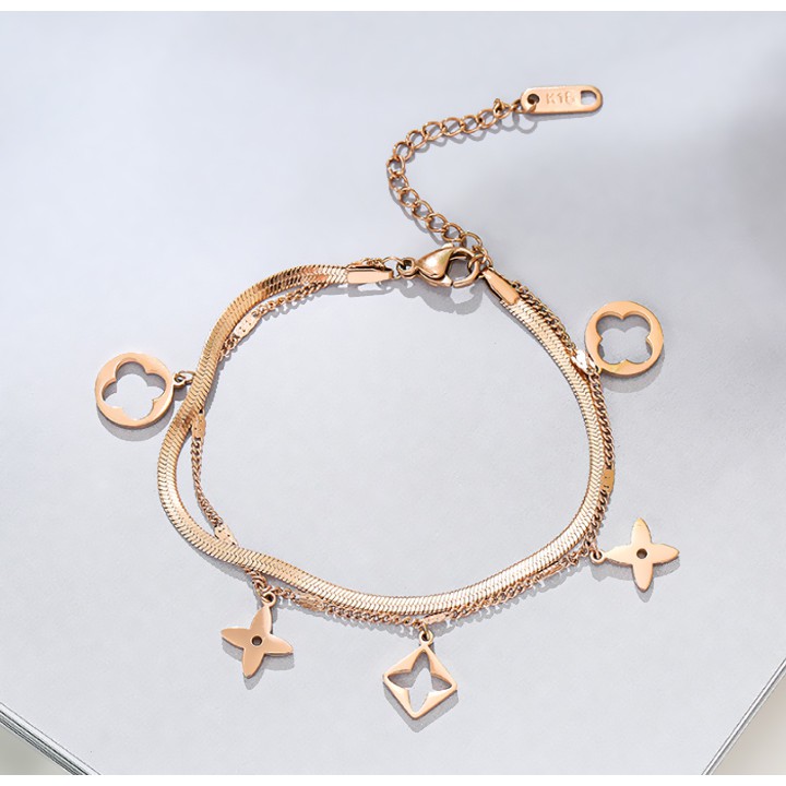 Lắc tay titan coa cấp kiểu 2 tầng dây mì+dập nhí rớt hoa 4 cánh cách điệu siêu đẹp, bền màu, hợp thời trang dễ phối đồ