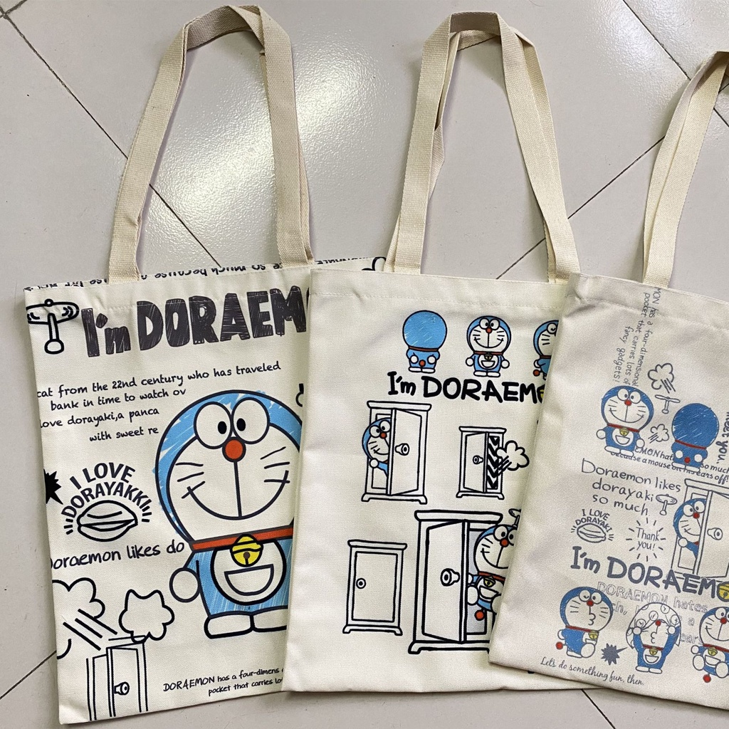 Túi xách đeo vai bằng vải canvas in họa tiết Doraemon đáng yêu cho nữ