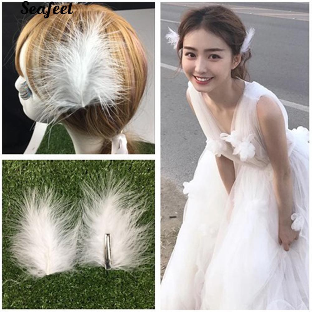 Set 2 kẹp tóc hình lông vũ đính đá ngọc và ngọc trai nhân tạo xinh xắn