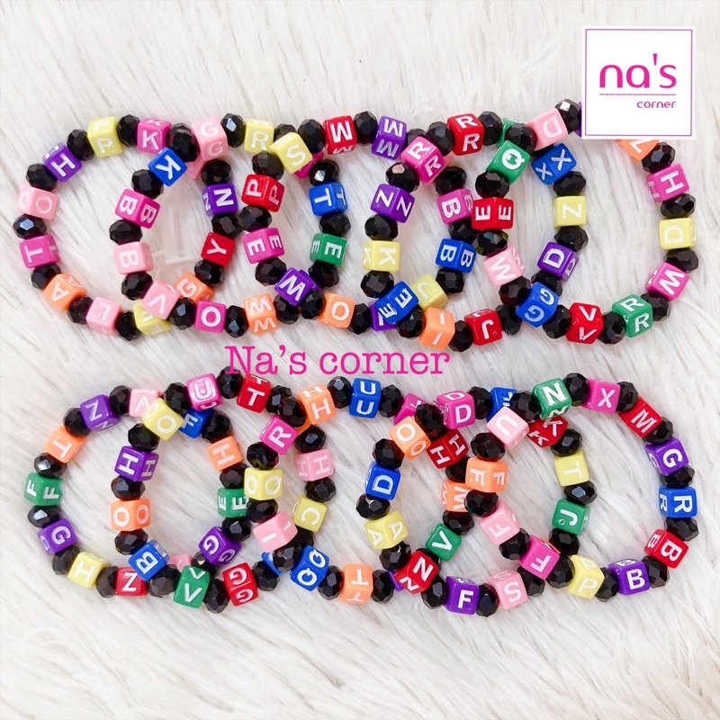 Vòng tay chữ hạt nhựa đủ màu dây cước thun