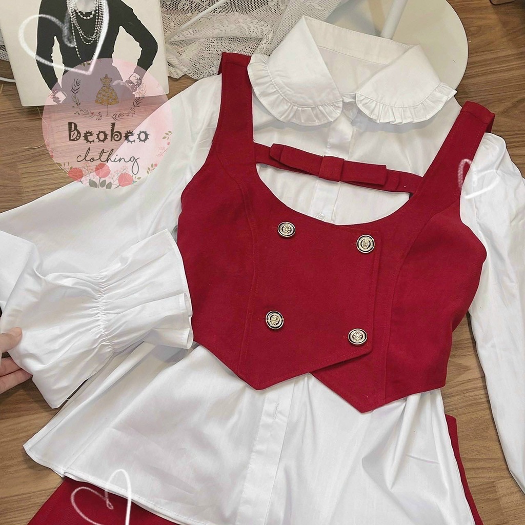 Set áo sơ mi tay phồng phối áo gile nút kèm chân váy chữ A