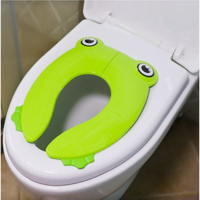 Nắp thu gọn bồn cầu cho bé đi vệ sinh có thể gắp gọn mang đi