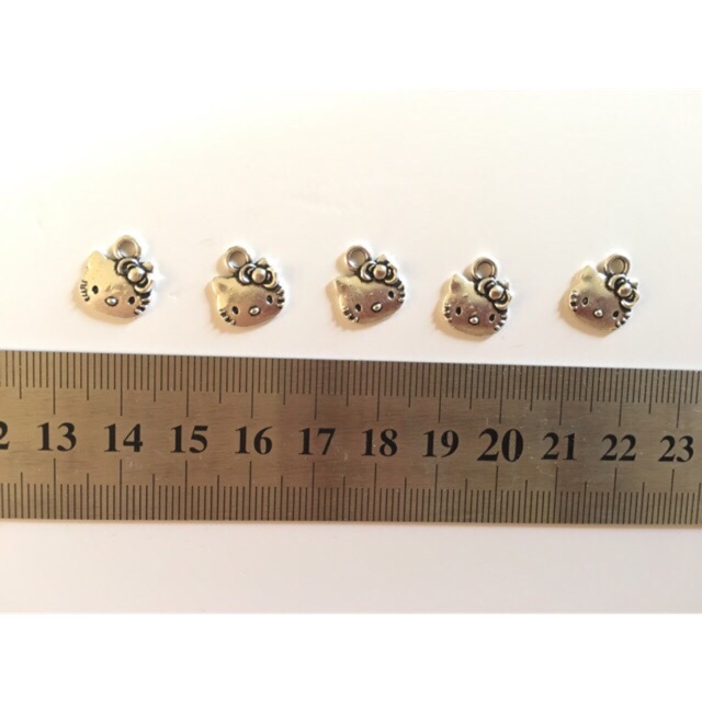 Sỉ 10 mặt mèo kitty xi bạc