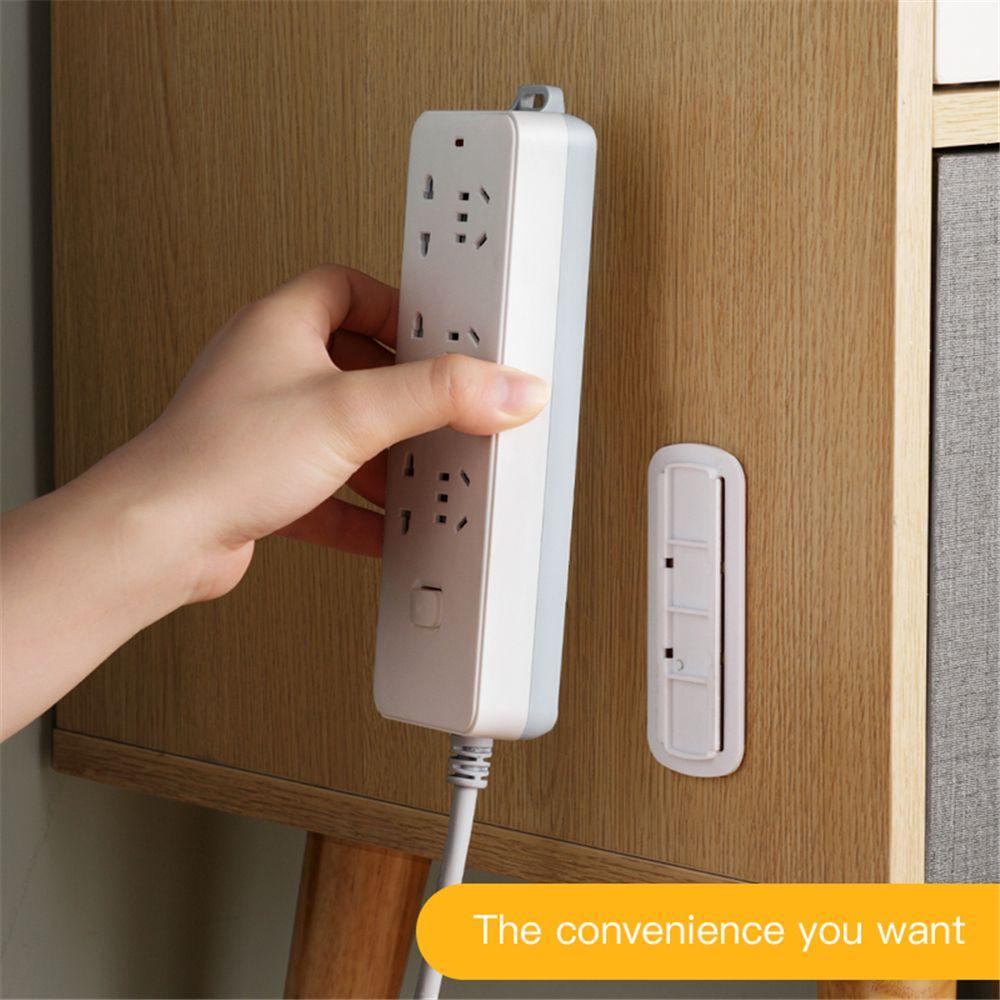 Giá Gắn Tường Tự Dính Để Cố Định Phích Cắm Tiện Dụng Và Bền