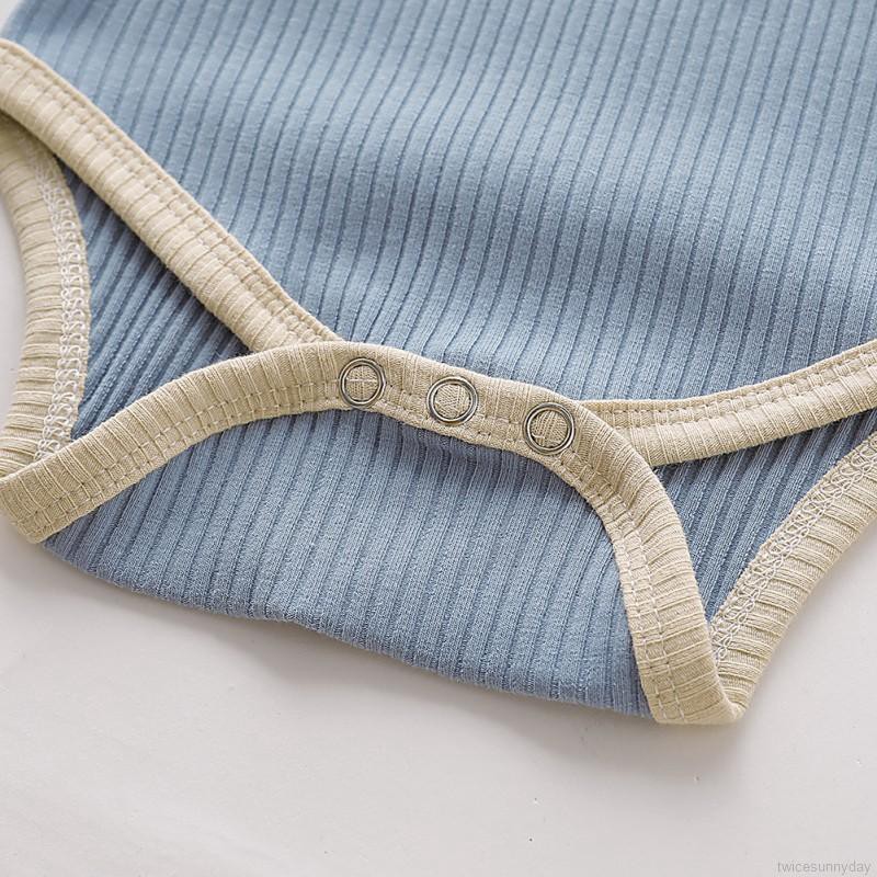 Bộ áo liền quần màu trơn cho bé