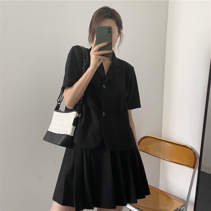 Set áo vest phối chân váy xoè xếp ly LeLa LDT12 màu đen nâu tây