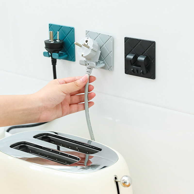 Móc dán tường treo phích cắm điện chống ẩm tiện dụng