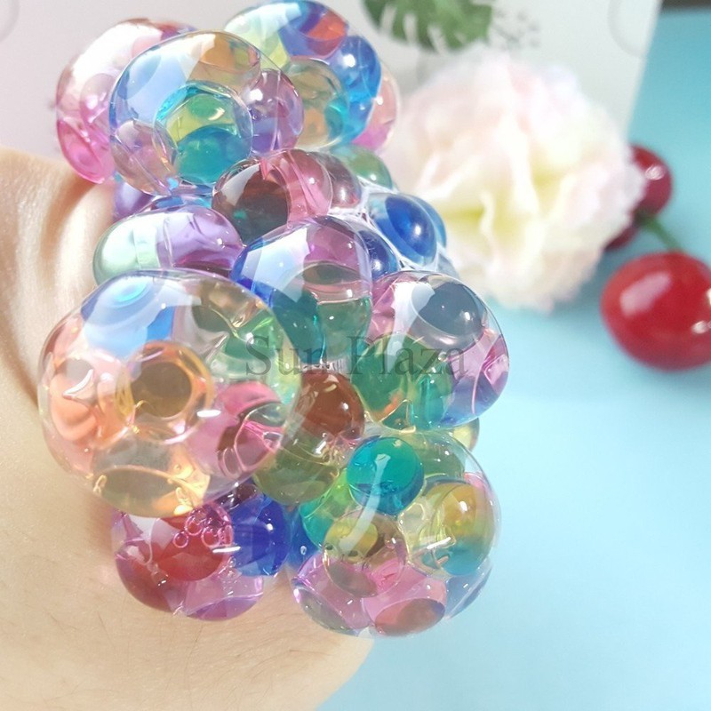 Bóng bóp lưới có hạt nở 5 màu cho bé Bhấp dẫn