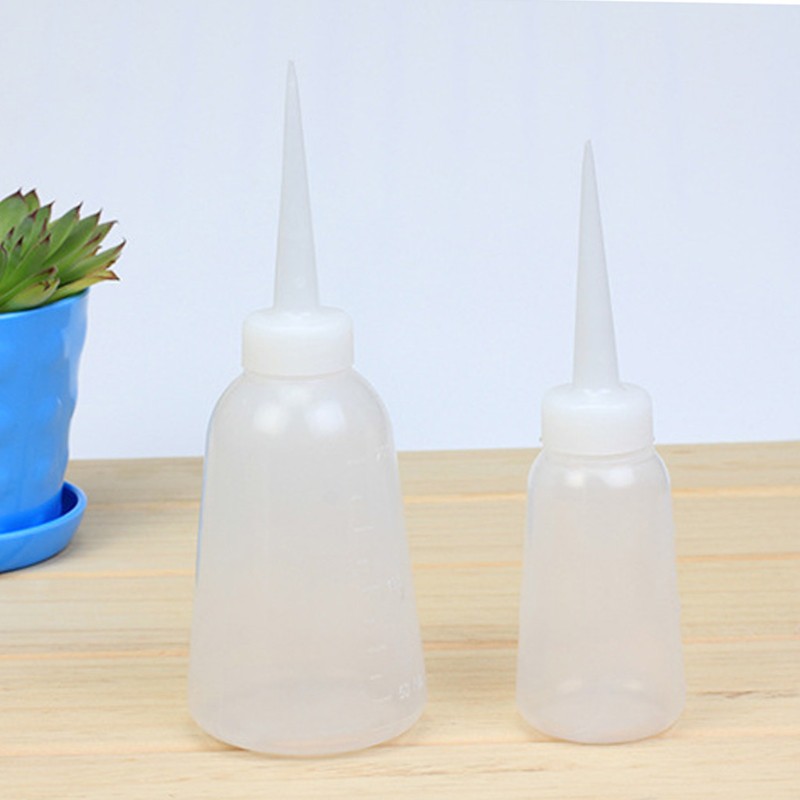Bình tưới nước dạng bóp bằng nhựa an toàn tiện dụng