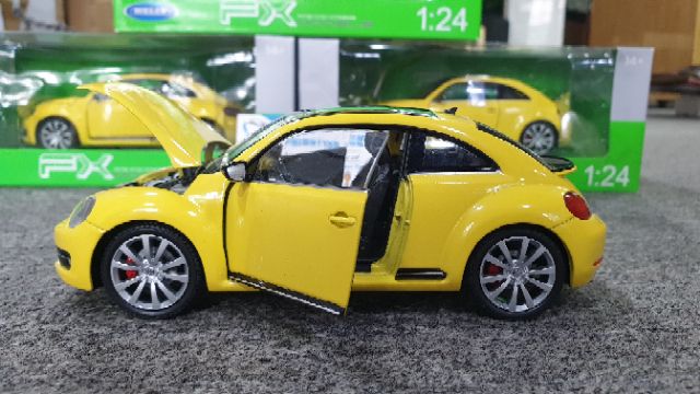 Xe mô hìnhVolkswagen Beetle 2013&lt;br&gt;Tỉ lệ : 1:24 Hãng sản xuất : Welly ( Vàng )