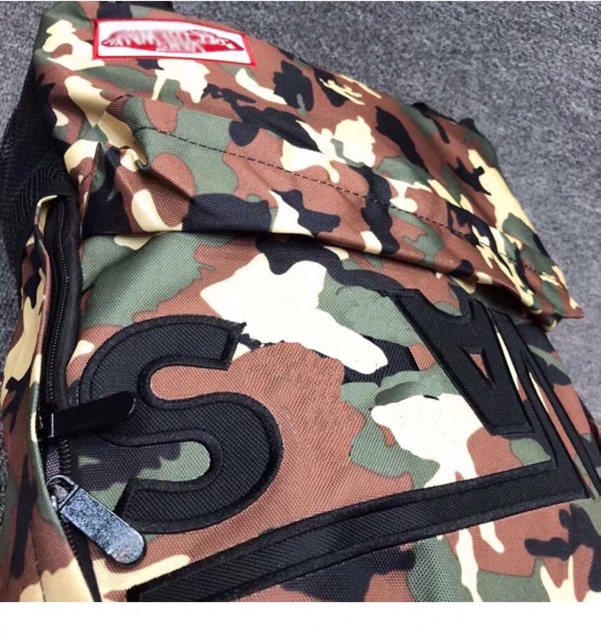 Balo vải bố hoạ tiết camo lính Vans