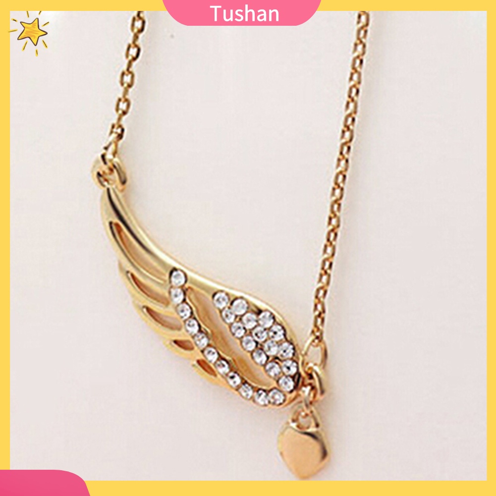 Dây chuyền mặt trái tim và đôi cánh thiên thần tush _