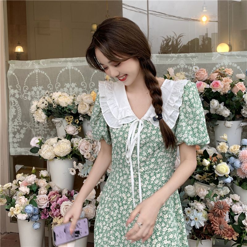 Váy hoa nhí cổ nơ dáng dài xòe ngắn tay màu xanh