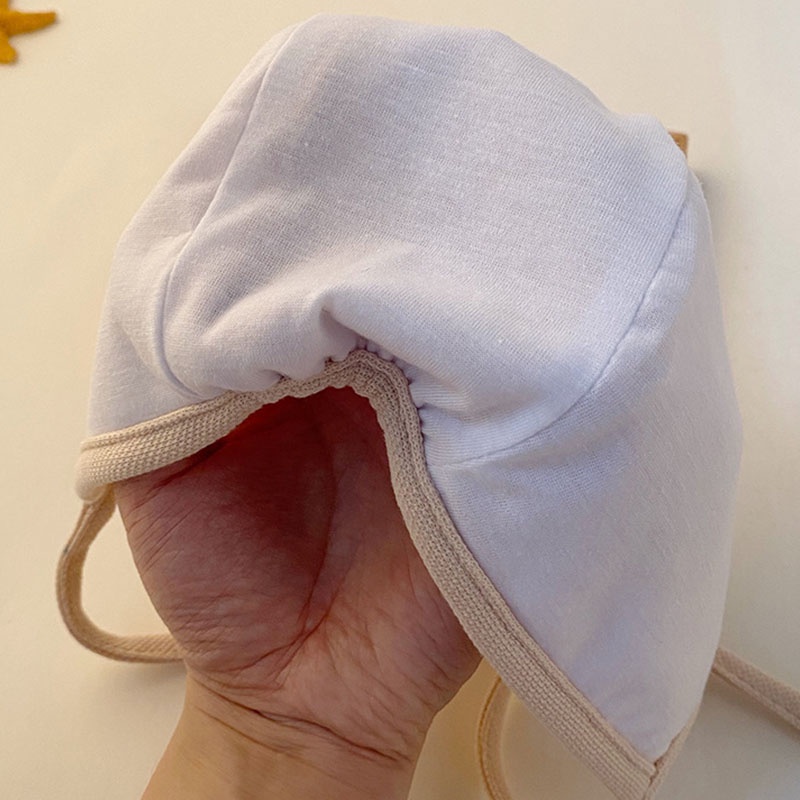 Mũ beanie mềm màu trơn bảo vệ tai họa tiết hoạt hình cho bé sơ sinh