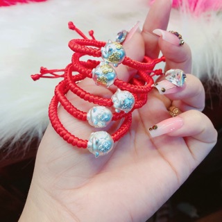 Lắc tay handmade chỉ đỏ mix lợn bạc