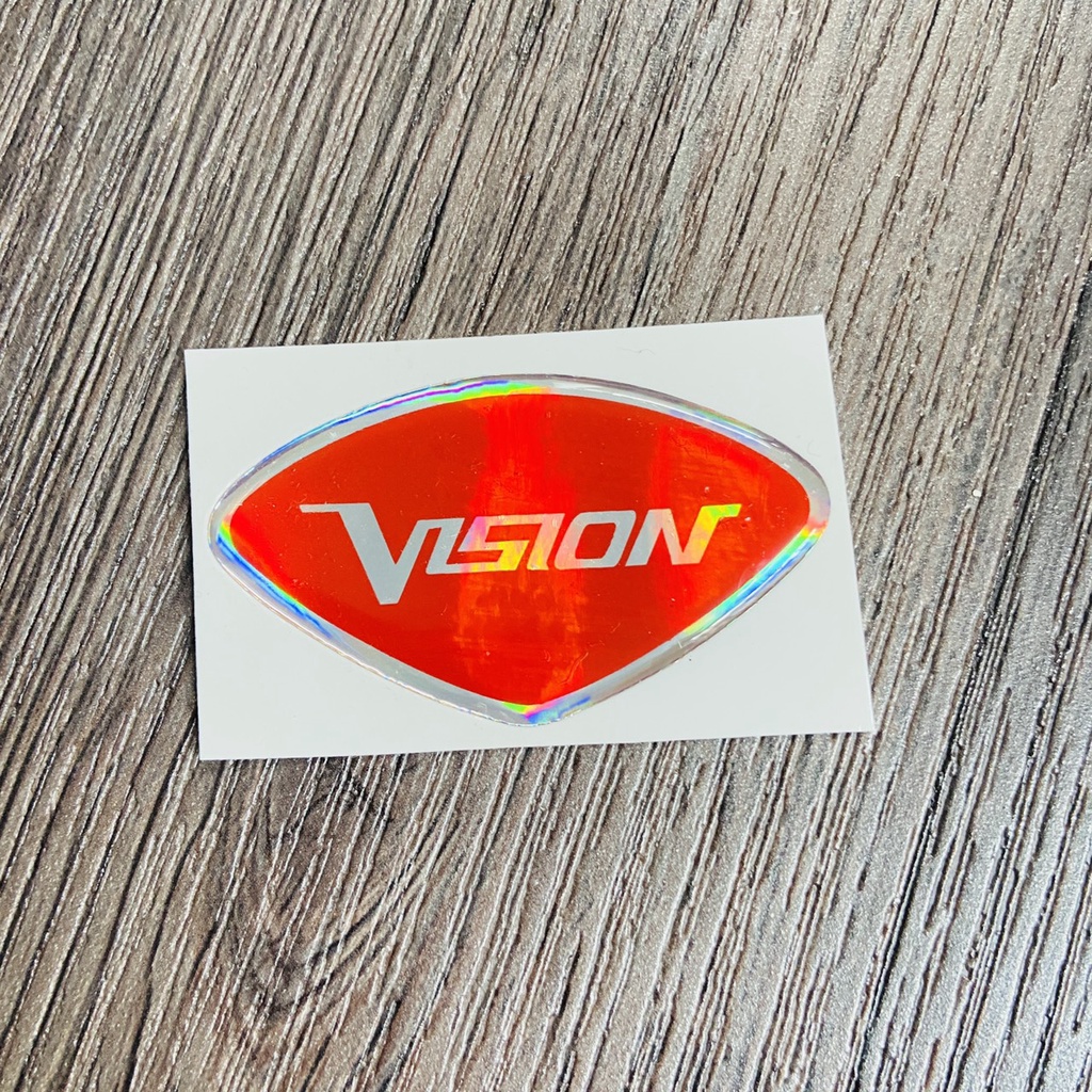 (TEM VISION) TEM LOGO VISION, tem phủ nhựa trong chữ VISION 2 màu lựa chọn