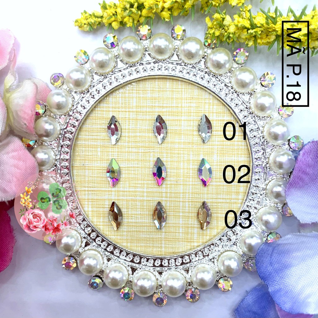 2 viên - Màu P18. Đá khối chân bằng siêu bắt sáng, đính dán móng.