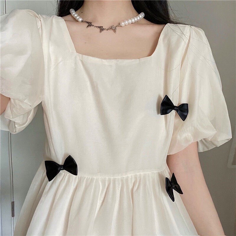 Đầm tiểu thơ xinh xắn HOT TREND Váy trắng đính nơ Váy dáng dài, cổ vuông siêu xinh cho nàng
