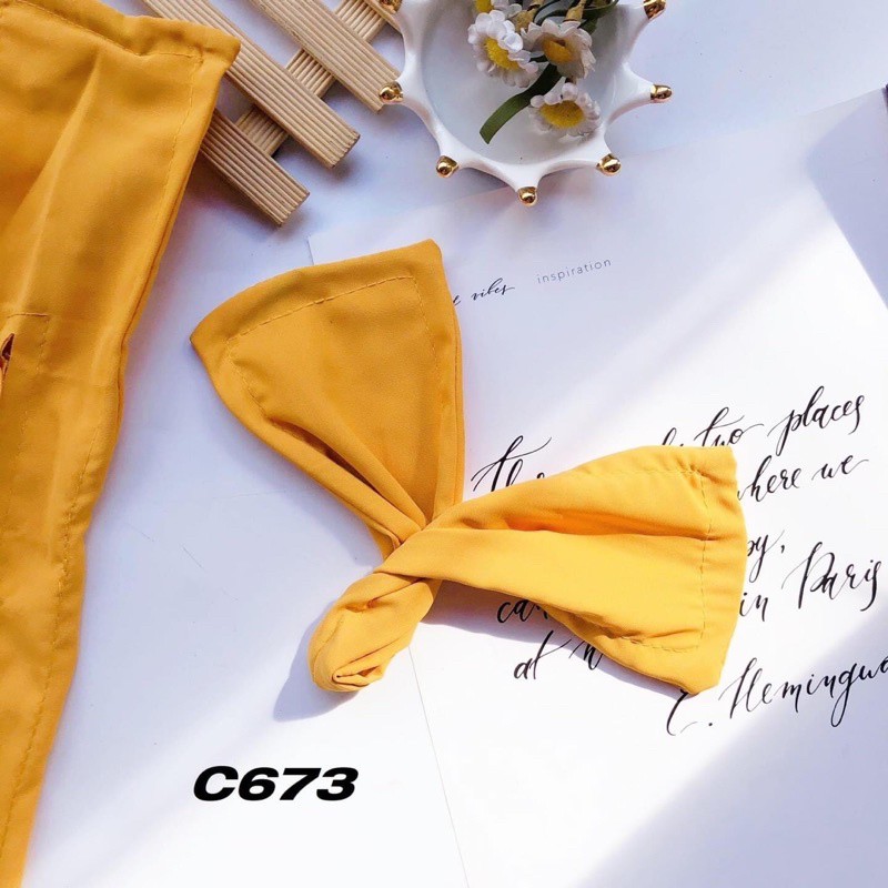 Buộc tóc xoắn nơ nữ