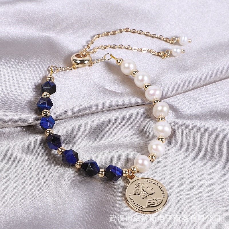 Vòng tay hạt ngọc trai nhân tạo 8ly mix đá xanh dương