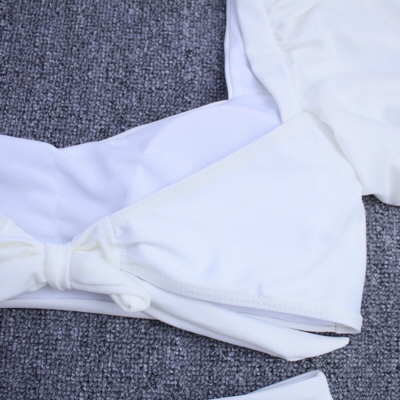Bikini 2 mảnh tay bồng buộc nơ 2 màu đen-trắng