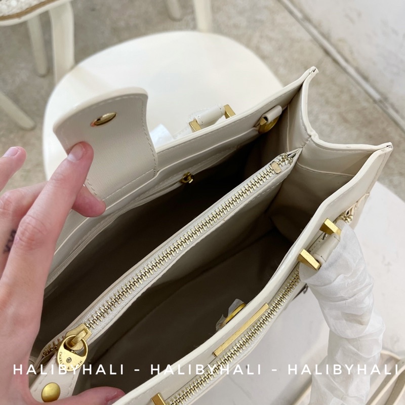 Túi cnk ngăn kéo trước có quai xách