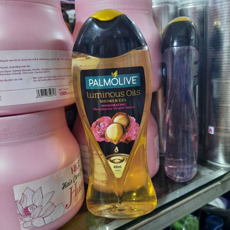 Dầu tắm phục hồi năng lượng Palmolive hạt mác ca và hoa mẫu đơn 400ml