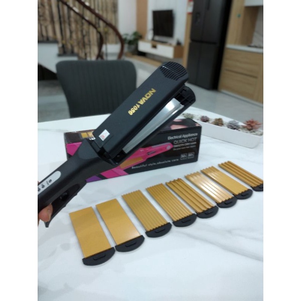 Máy làm tóc Guangming  8 lưỡi MS 1056