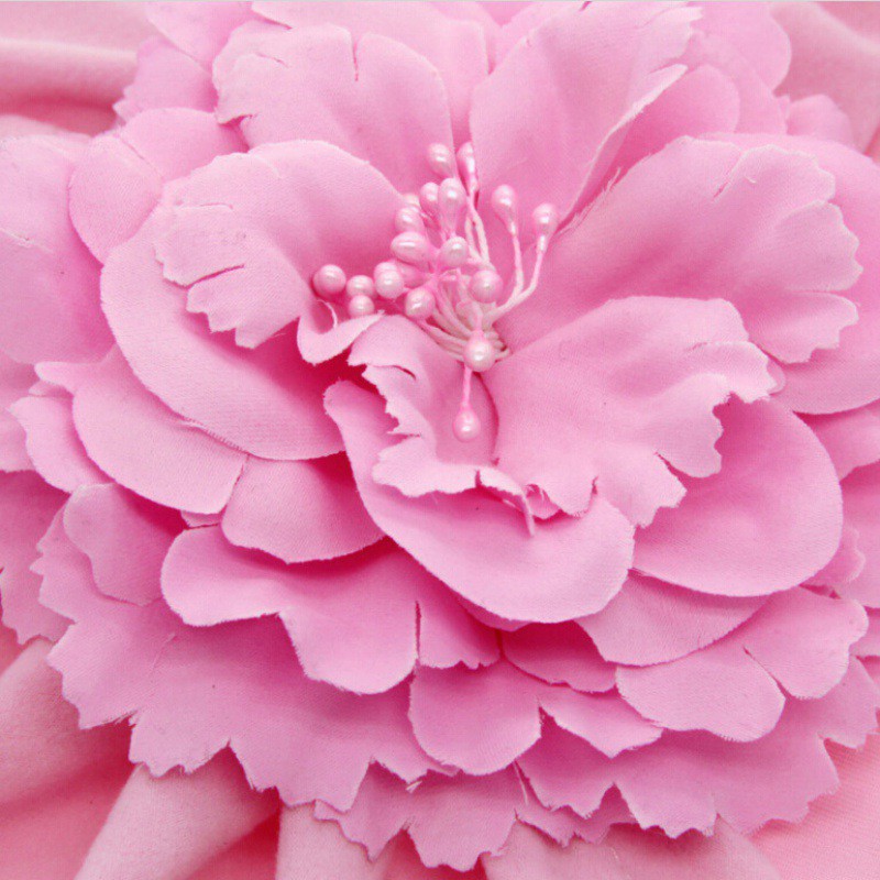 Nón trùm đầu màu trơn có hoa xinh xắn cho bé