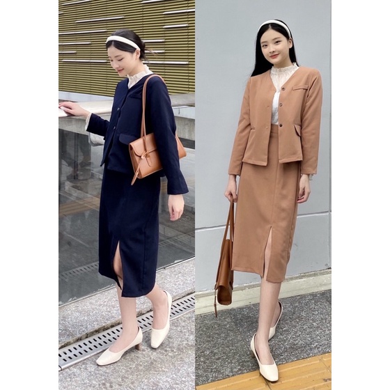 Jamila Set - 2 màu xanh đen, nâu be. Set áo vest không cổ, chân váy dáng suông xẻ trước. Chất tuyết mưa